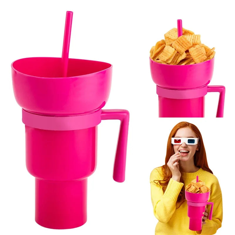 Pink cup with handle and straw, filled with snacks, on a white background