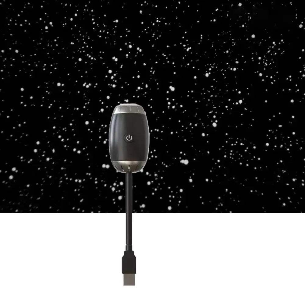 Black electronic device with power symbol on a black background with white dots