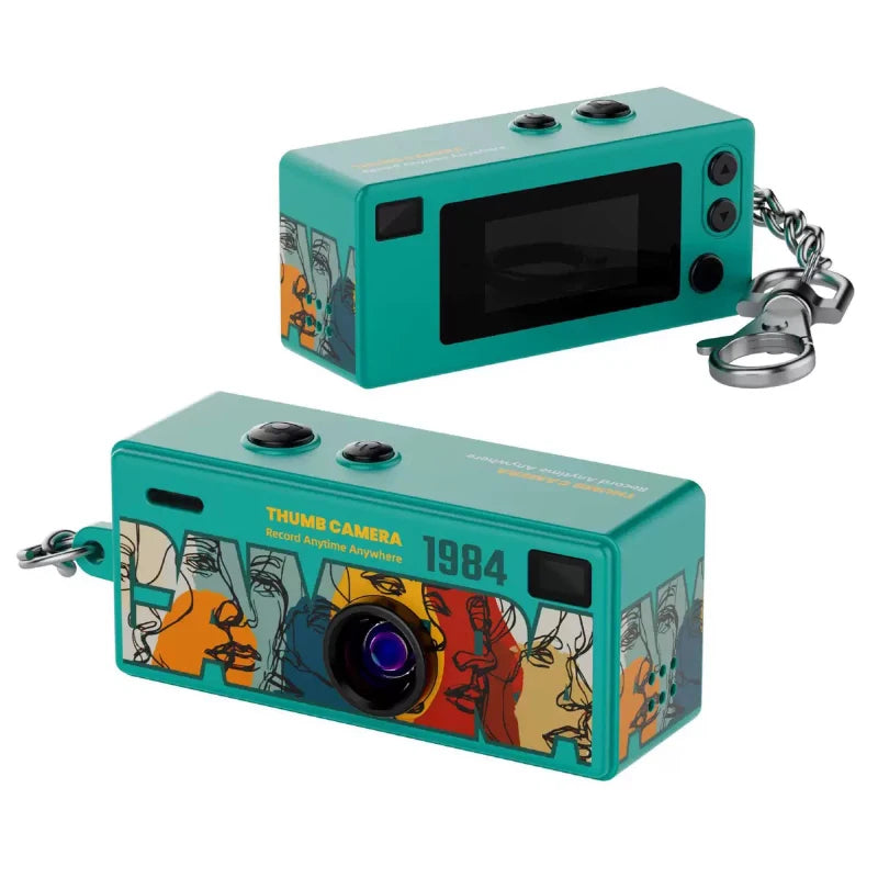 Teal miniature camera with colorful design on a white background