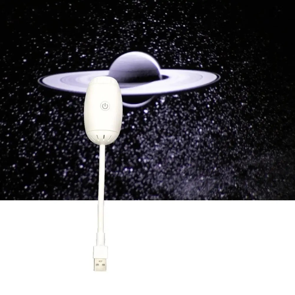 White USB device with a cord against a space-themed background