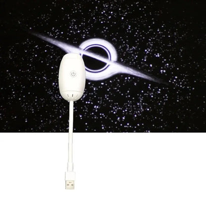 White USB device with cable against a space-themed background