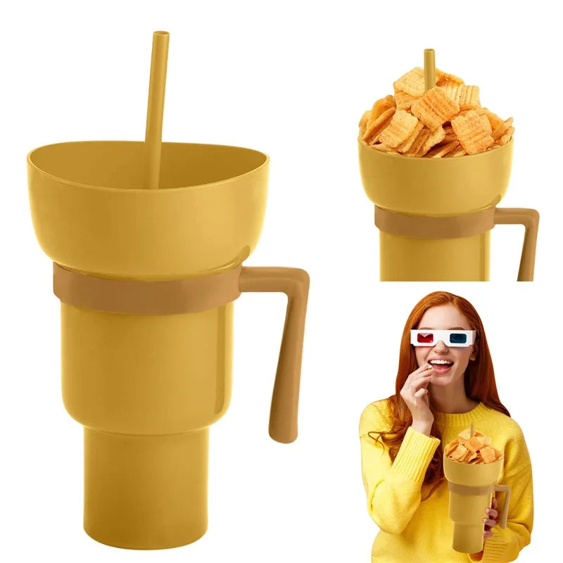 Yellow snack cup with handle and straw, filled with chips, on a white background.