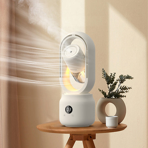 White fan on a wooden table with a plant and small cup in a room with soft lighting.