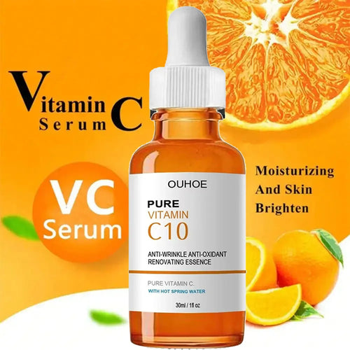 Vitamin C serum bottle with oranges on an orange background
