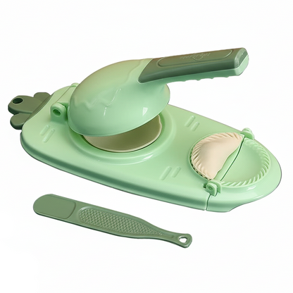 Green kitchen tool with a peeler attachment on a white background