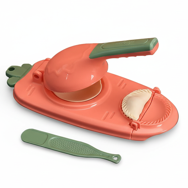 Peach-colored kitchen tool with green accents on a white background