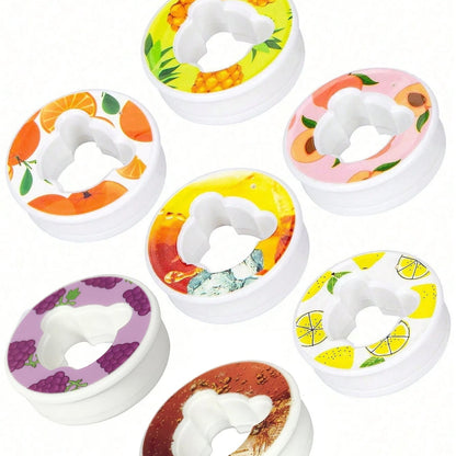 Set of six colorful donut-shaped cookie cutters on a white background