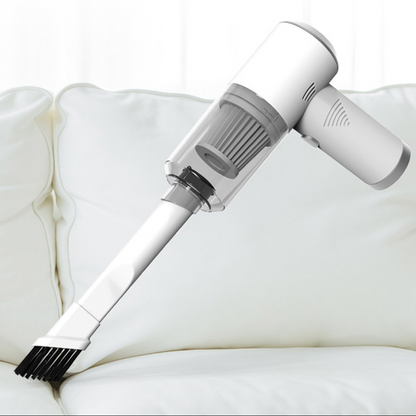 White handheld vacuum cleaner with brush attachment on a white background