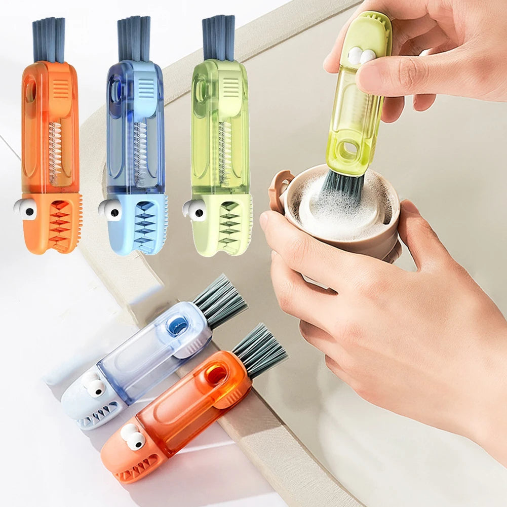 Set of colorful brush cleaning tools with a hand using one to clean a small container.