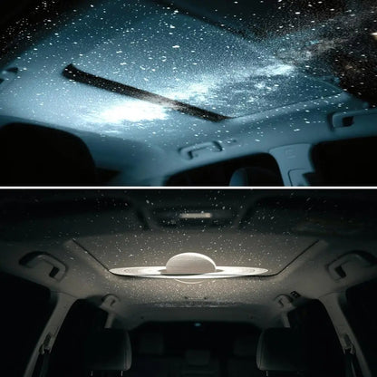 Car interior with starry sky effect on the ceiling and Saturn model on a dark background