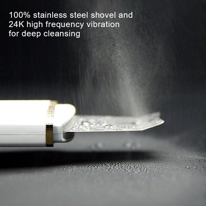 Stainless steel shovel with dust being blown away on a dark background