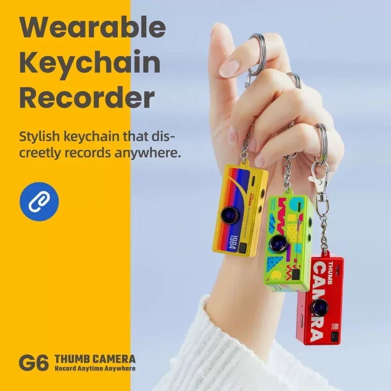 Colorful cassette tape-shaped keychains worn on a wrist with promotional text for a wearable keychain recorder.