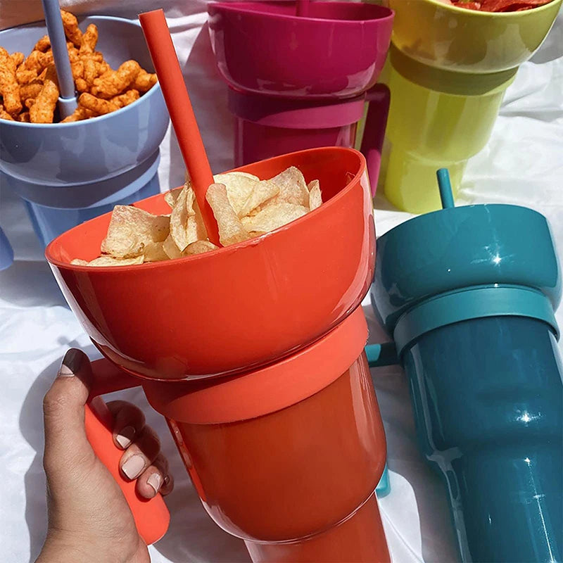 Colorful snack cups with snacks and straws on a white surface