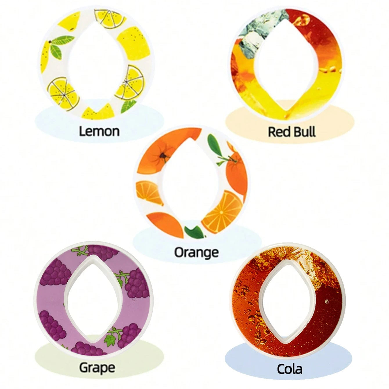 Five B Set Oval shape, fruit-themed coasters labeled Lemon, Red Bull, Orange, Grape, and Cola on a white background.