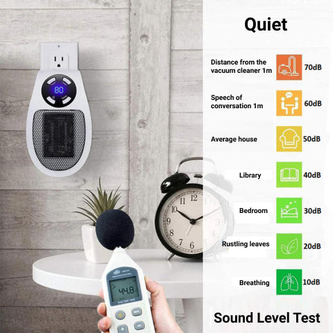 Vacuum cleaner with sound level meter and noise level chart on a wooden background