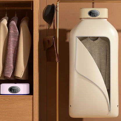 Beige clothes ironing machine in a wardrobe with hanging clothes.