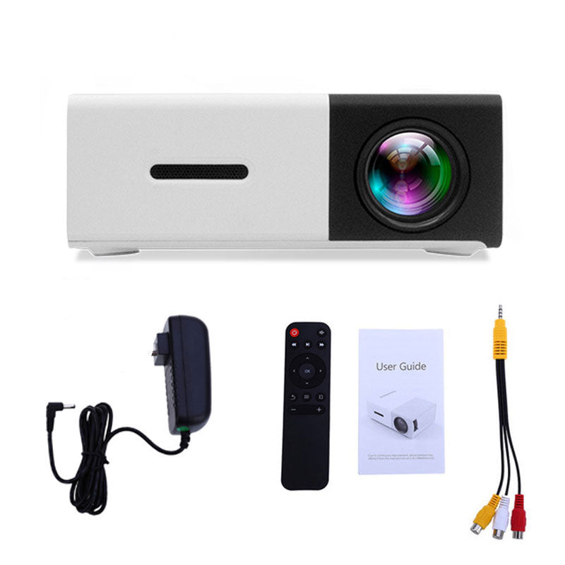 FlixeMatix White Laser Projector with accessories including a power cable, remote control, user guide, and audio cables on a white background.