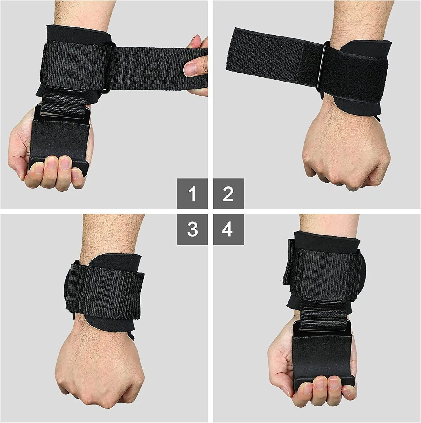 Black wrist straps being worn on hands against a gray background