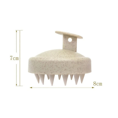 Beige scalp massager with dimensions labeled on a white background
