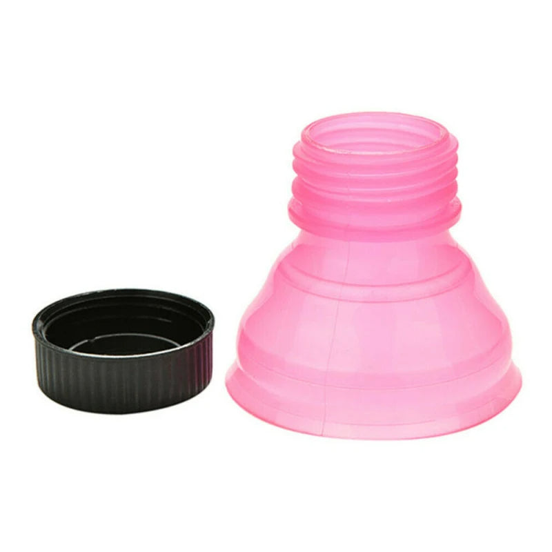 Pink and black silicone bottle adapter on a white background