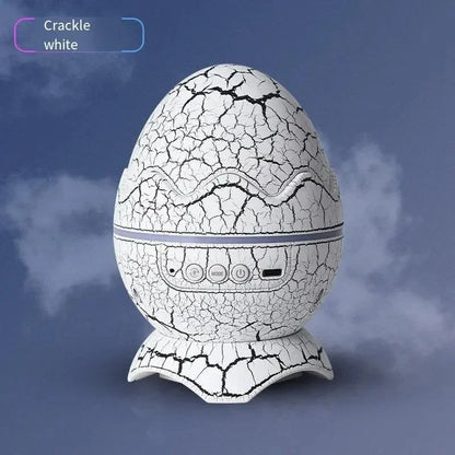 White egg-shaped light projector with crackle finish on a dark background