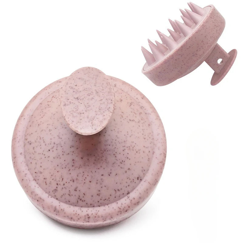 Pink speckled kitchen tool with a lid on a white background