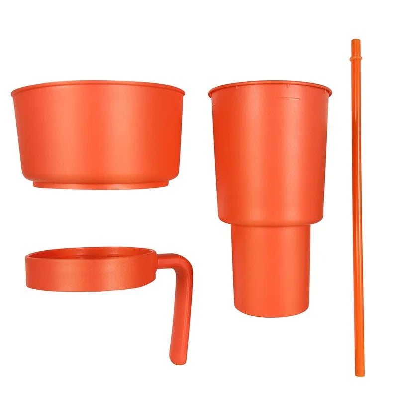 Set of orange plastic cups with a handle and straw on a white background