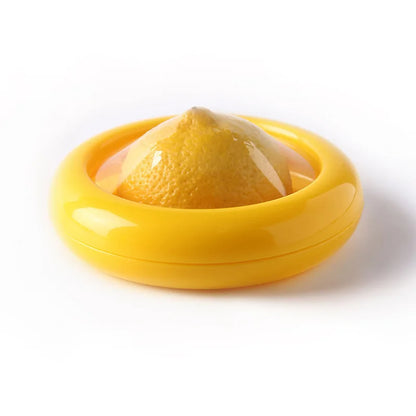 Yellow lemon squeezer with a lemon inside on a white background