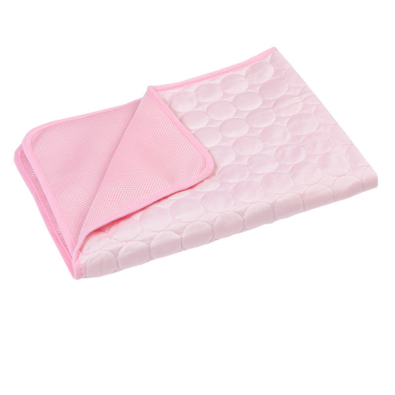 Pink quilted blanket on a white background