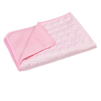 Pink quilted blanket on a white background