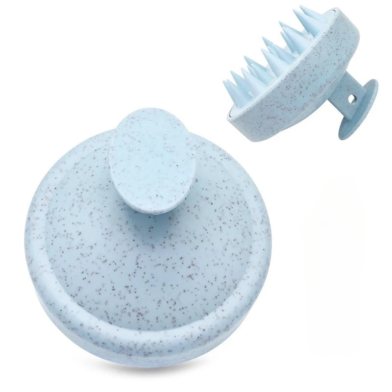 Blue speckled kitchen tool with a round base and textured top on a white background
