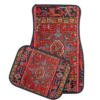 Two patterned car floor mats with intricate designs on a white background